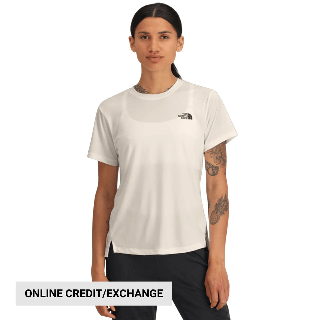 White short-sleeve crewneck T-shirt with a small chest logo, shown on a model against a white background.