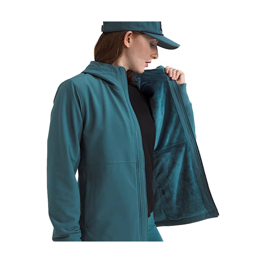 Teal hooded zip-up jacket with a fuzzy fleece lining, shown partially unzipped on a model