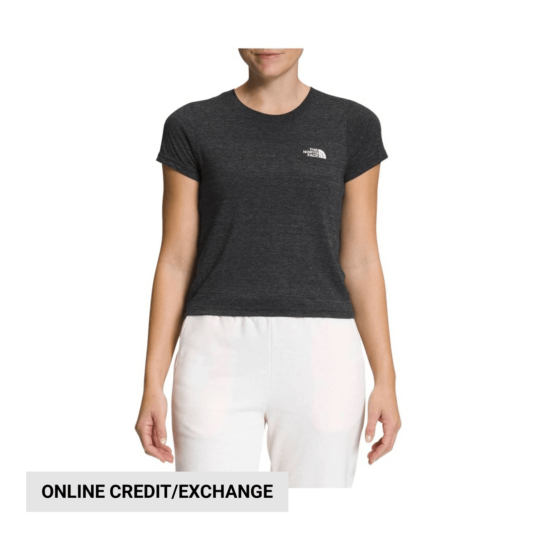 Dark charcoal heather crewneck T-shirt with small chest logo, shown on a model