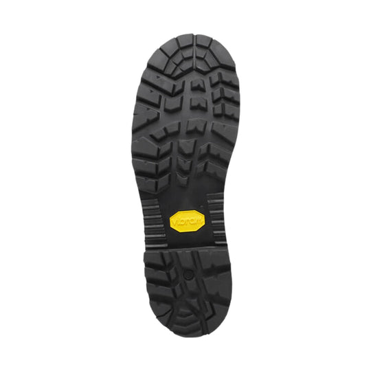 Black lugged work boot outsole with a yellow Vibram logo