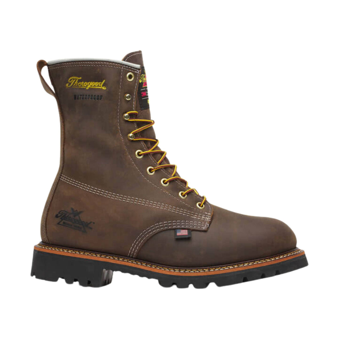 Brown lace-up waterproof work boot with yellow laces and a black lug sole