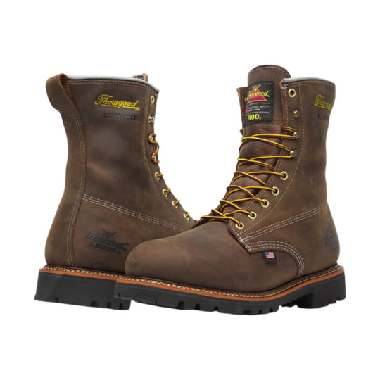 Brown leather lace-up work boots with yellow laces and black lug soles