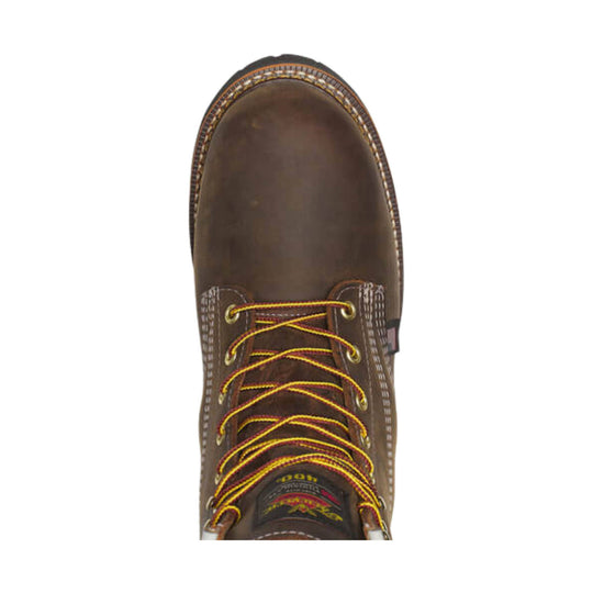 Brown leather lace-up work boot with yellow laces and contrast stitching, top-down view