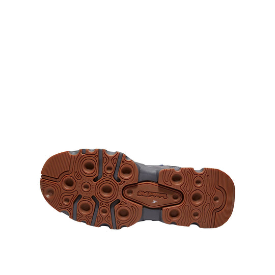 Brown and black shoe outsole with circular tread patterns and Timberland Pro branding