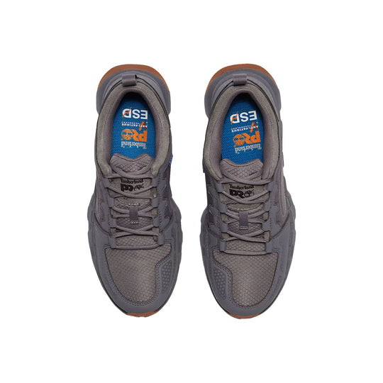 Pair of gray work shoes viewed from above with blue insoles and Timberland PRO branding.