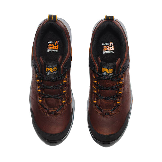 Brown and black low-cut work shoes with bungee laces and padded collars