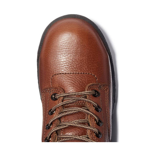 Brown leather lace-up boot toe with black outsole and tan speckled laces