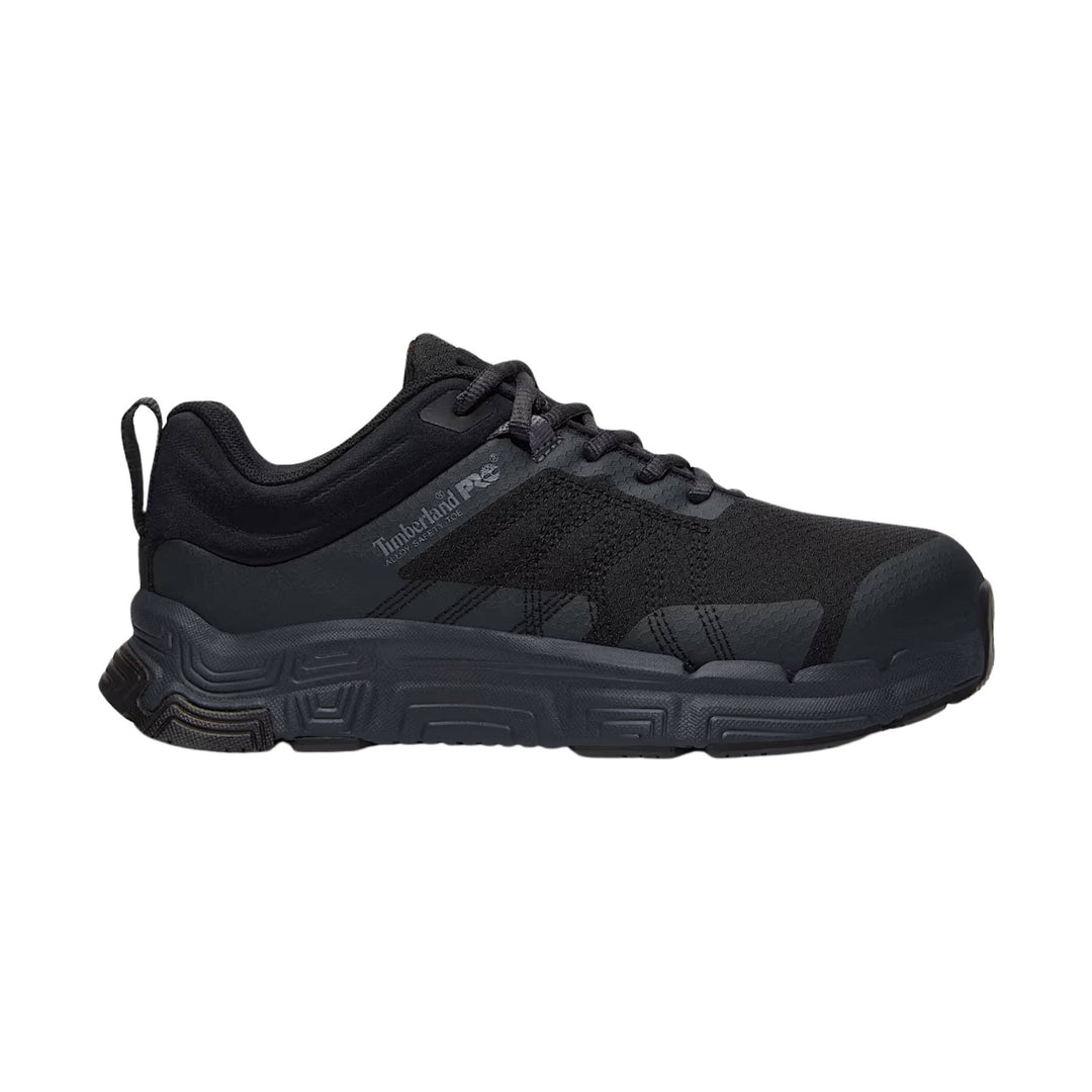 Black low-top work sneaker with knit upper, lace-up front, and thick treaded sole