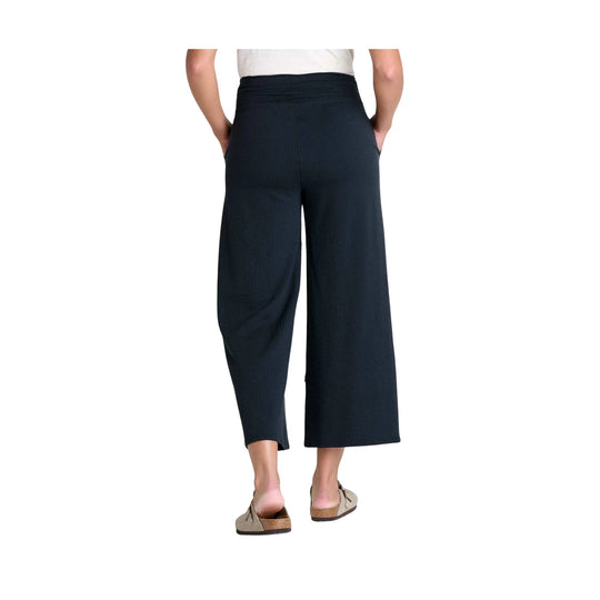 Black textured wide-leg cropped pants shown from the back