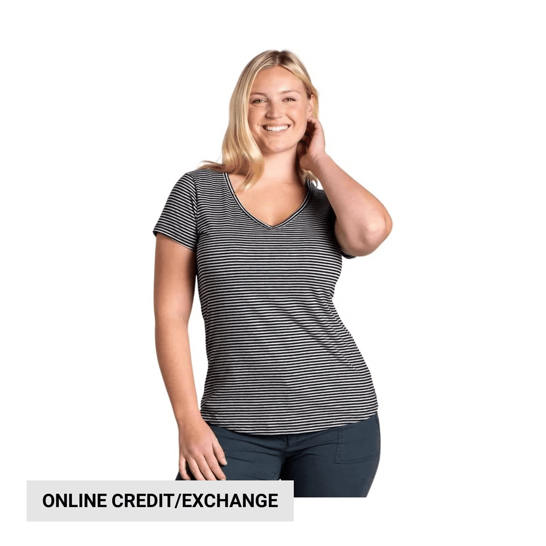 Woman wearing a black-and-white striped V-neck short-sleeve tee
