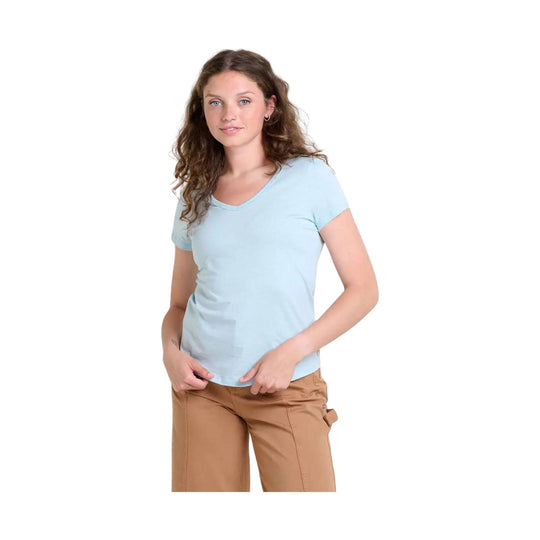 Light blue short-sleeve V-neck T-shirt on a model with tan pants