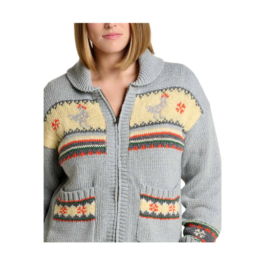 Gray knit zip-front cardigan with patterned cream panels, pockets, and a shawl collar