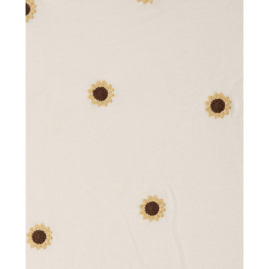 Cream knit top with small embroidered daisy flowers in yellow and brown