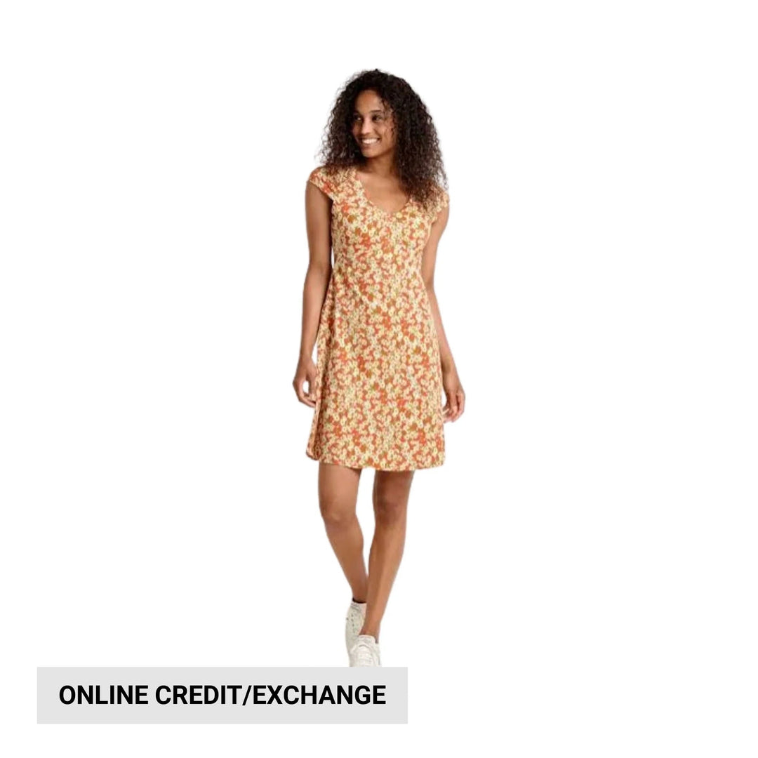 Floral short-sleeve A-line dress on a model with white sneakers