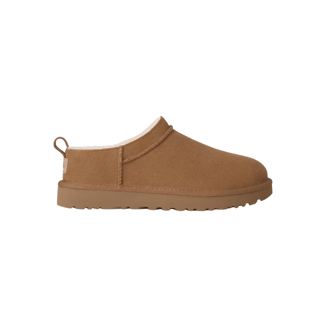 Chestnut brown suede ankle boot with a pull tab, white lining, and thick treaded sole