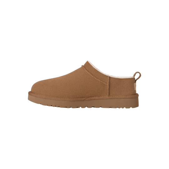 Chestnut suede slip-on boot with a thick tan sole and rear pull loop, side view