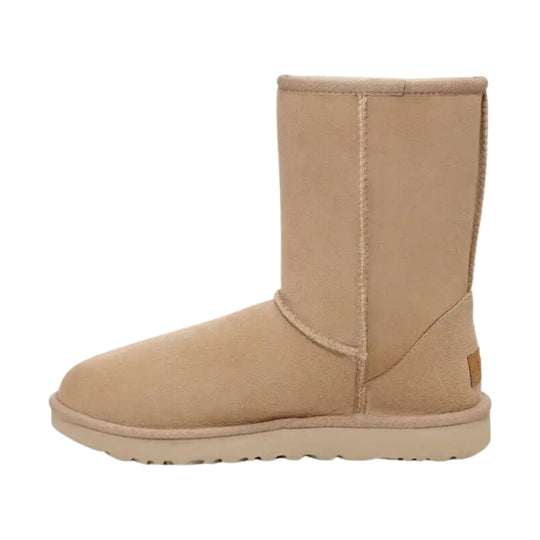 Tan suede mid-calf boot with a rounded toe and thick sole, side view