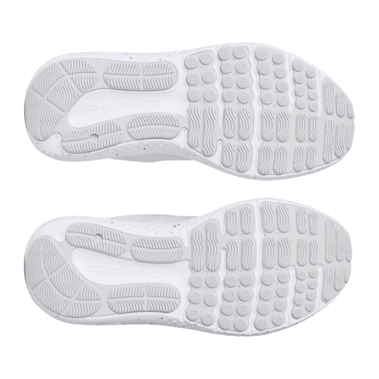 Pair of white running shoe outsoles with segmented tread and small blue speckles