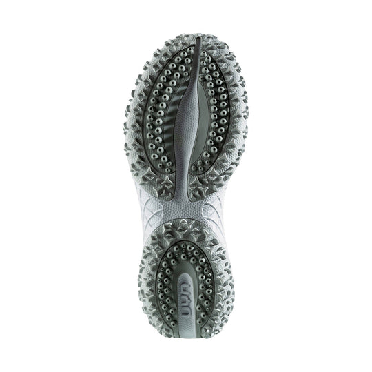 White and gray athletic shoe outsole with aggressive tread and textured traction pods, shown from below