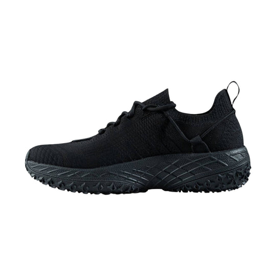 Black low-top trail shoe with knit upper, wraparound sole, and heel pull tab
