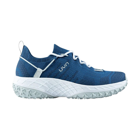 Blue knit trail shoe with white laces, thick white midsole, and grippy gray outsole