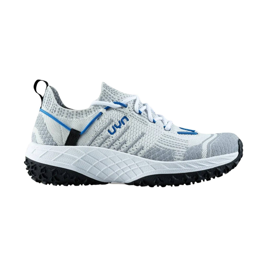 Light gray knit trail shoe with blue accents, white laces, black pull tab, and lugged black outsole