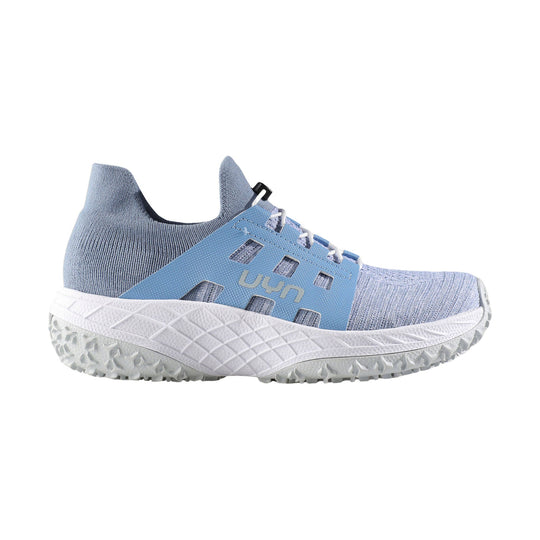 Light blue knit athletic shoe with side cutouts, white textured sole, and visible UYN logo