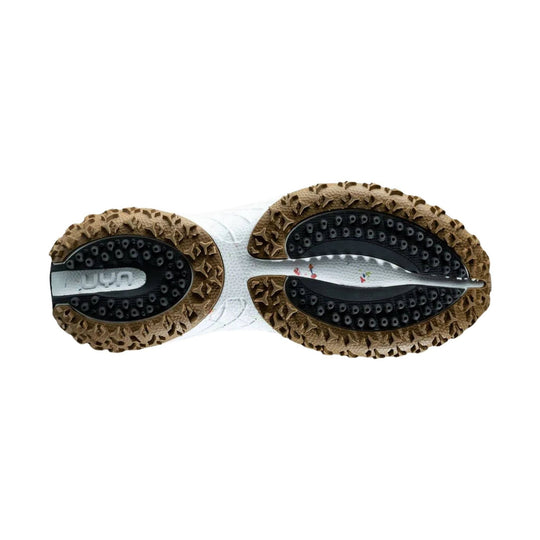 Shoe outsole with brown lug tread, black perforated grip panels, and white midsole