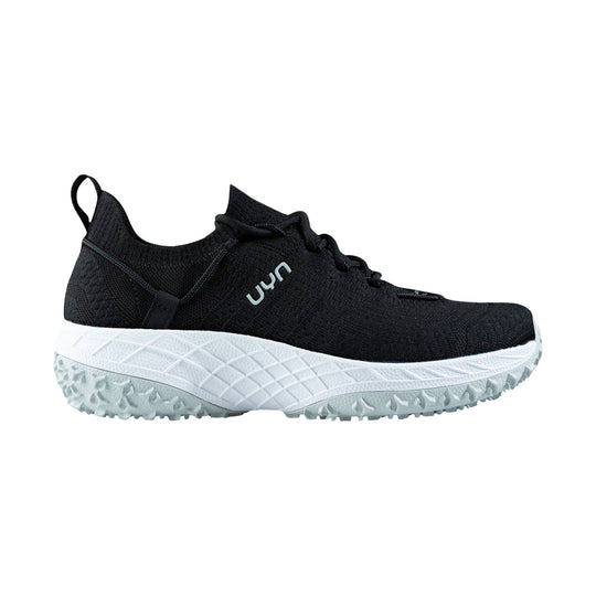 Black knit low-top sneaker with white midsole and lugged outsole, shown in side view