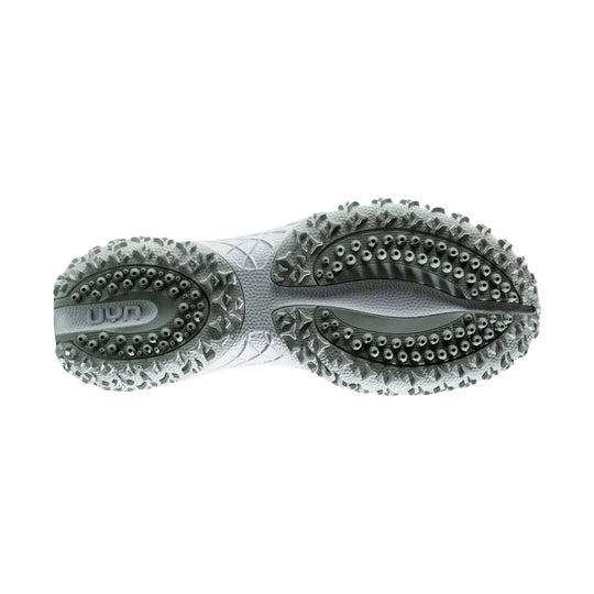 Gray shoe outsole with rugged tread and circular traction pods, shown from the bottom