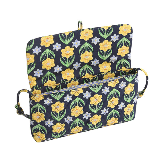 Quilted floral shoulder bag with top handle and side loops