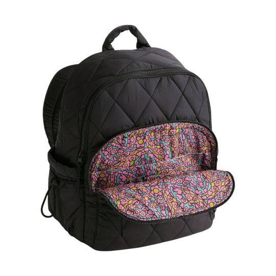 Black quilted backpack with a front zip pocket and pink floral print panel