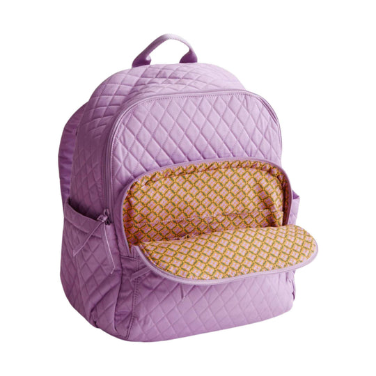 Quilted lavender backpack with front zip pocket and patterned interior lining