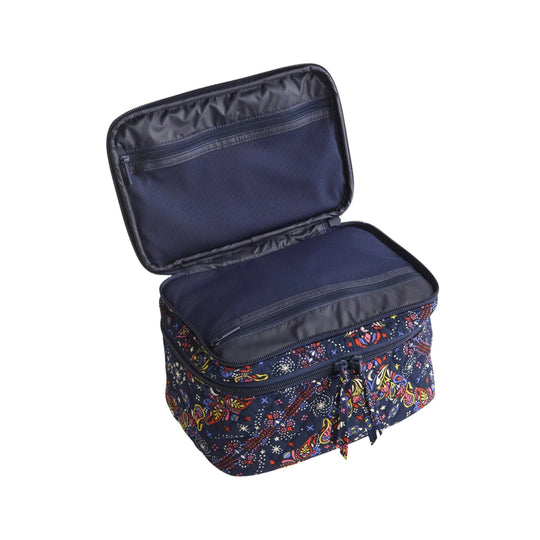 Open navy patterned zippered cosmetic case with two compartments