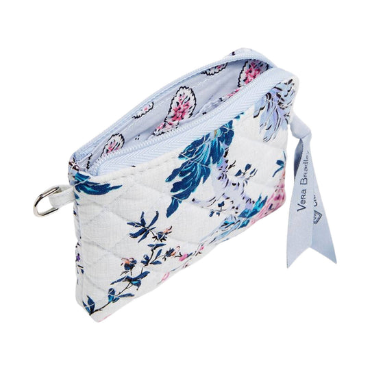 Small quilted floral zip pouch with a side metal ring and hanging ribbon tag