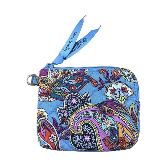 Quilted blue floral coin purse with zipper top, wrist strap, and side clip