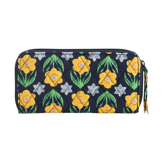 Quilted navy floral continental wallet with yellow flowers and green leaves