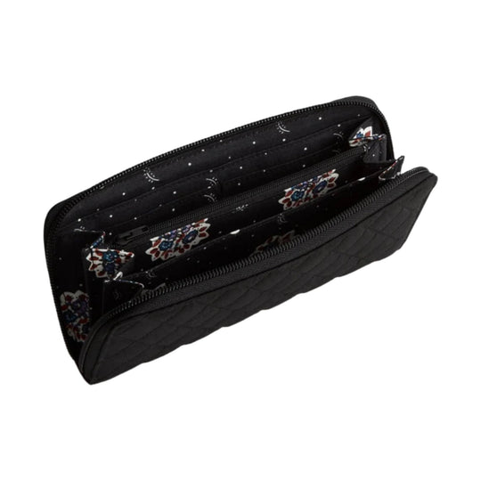 Black quilted zip-around wallet with floral-patterned interior lining and multiple card slots