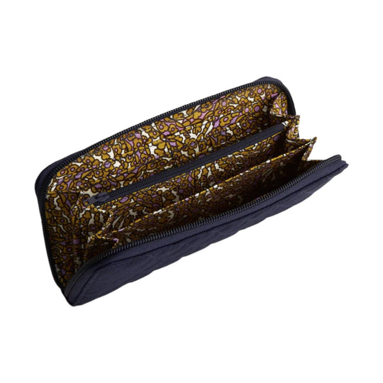 Open navy zip-around wallet with floral patterned interior