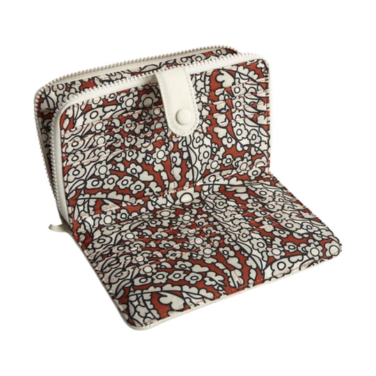 Fold-over zip-around wallet with red, white, and black floral pattern