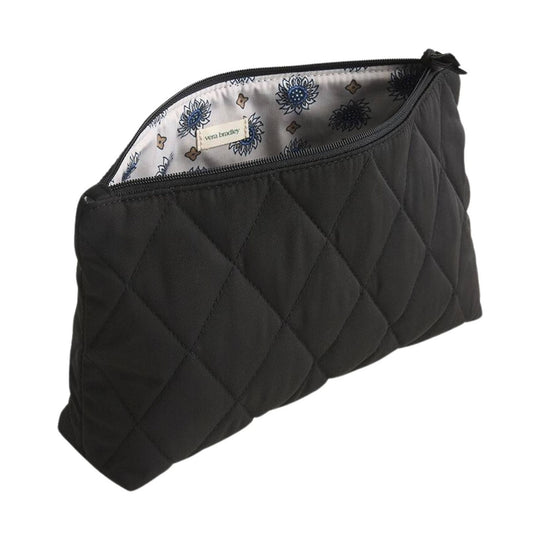 Black quilted zip pouch with patterned fabric lining