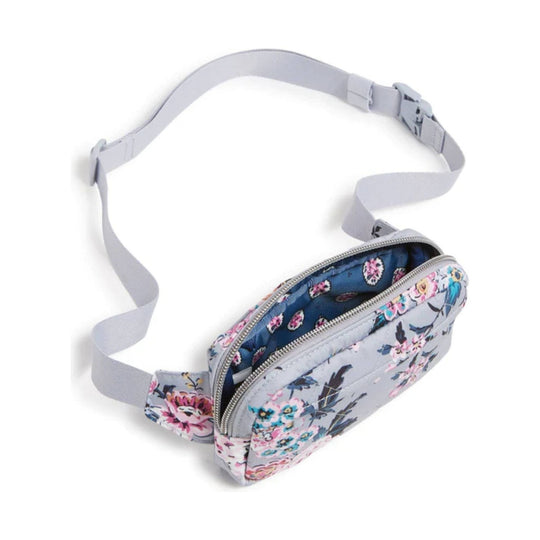 Light gray floral zippered belt bag with an adjustable strap