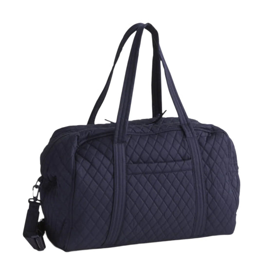 Black quilted duffel bag with long shoulder straps
