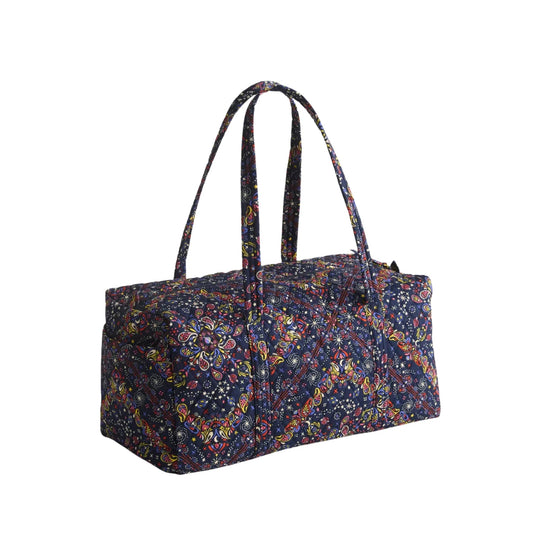Navy patterned quilted duffel bag with long shoulder straps