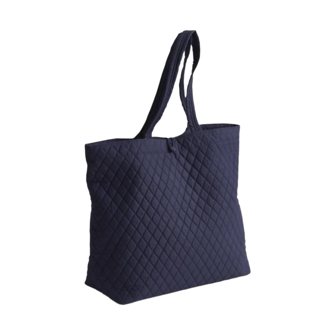 Dark navy quilted tote bag with long shoulder straps