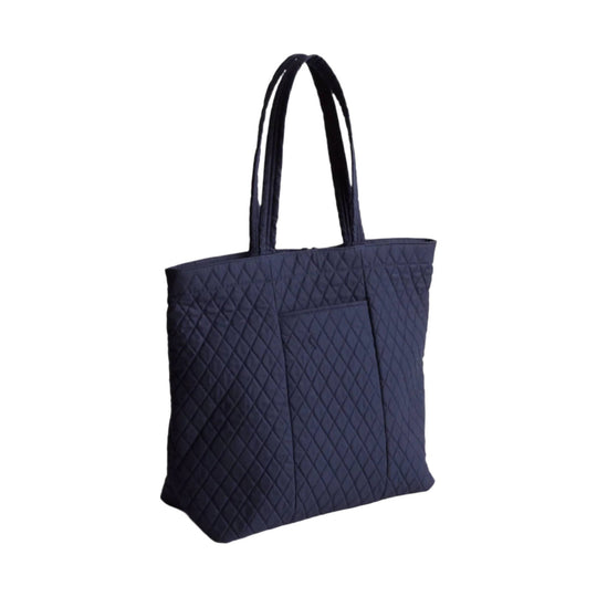 Navy quilted tote bag with long shoulder straps and a front pocket
