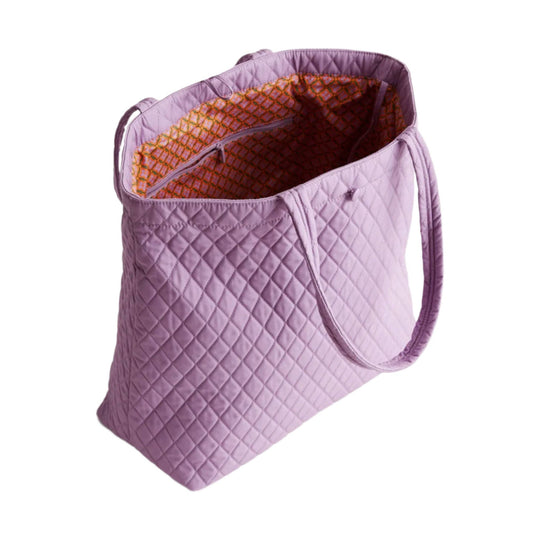 Lavender quilted tote bag with shoulder straps and patterned lining