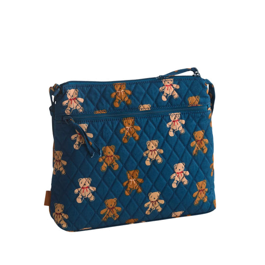 Blue quilted zip crossbody pouch with teddy bear print and front zip pocket