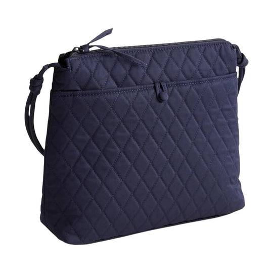 Quilted navy crossbody pouch with top zipper and front slip pocket