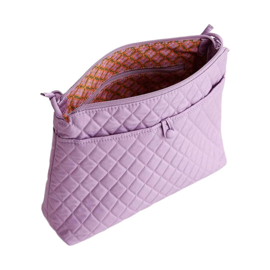 Quilted lavender zip-top crossbody bag with patterned lining